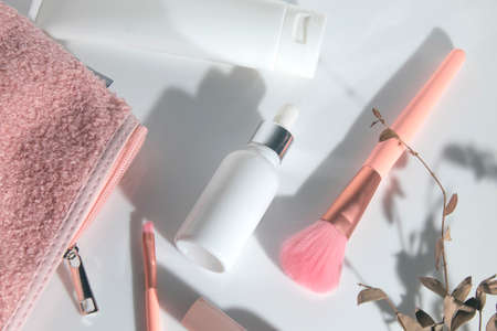 mockup of beauty fashion cosmetic makeup bottle serum dropper product with skincare healthcare product concept on backgroundの写真素材