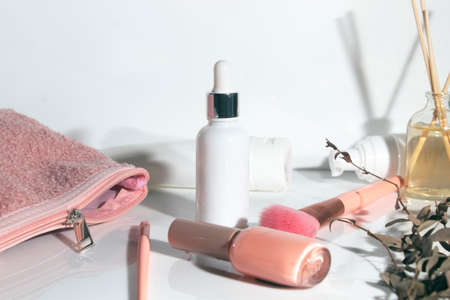 mockup of beauty fashion cosmetic makeup bottle serum dropper product with skincare healthcare product concept on backgroundの写真素材