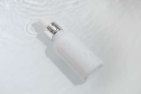 mockup of beauty fashion cosmetic makeup bottle lotion product with skincare healthcare concept on backgroundの写真素材