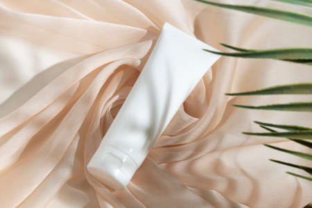 mockup of beauty fashion cosmetic makeup bottle lotion product with skincare healthcare concept on backgroundの写真素材