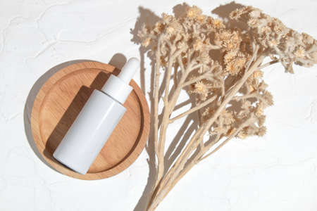 mockup of beauty fashion cosmetic makeup bottle lotion product with skincare healthcare concept on backgroundの写真素材