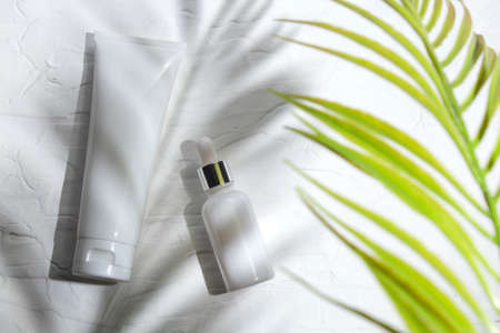 mockup of beauty fashion cosmetic makeup bottle lotion product with skincare healthcare concept on backgroundの写真素材