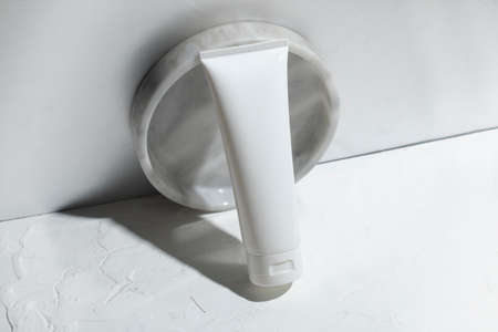 mockup of beauty fashion cosmetic makeup bottle lotion product with skincare healthcare concept on backgroundの写真素材