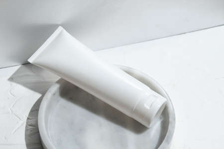 mockup of beauty fashion cosmetic makeup bottle lotion product with skincare healthcare concept on backgroundの写真素材