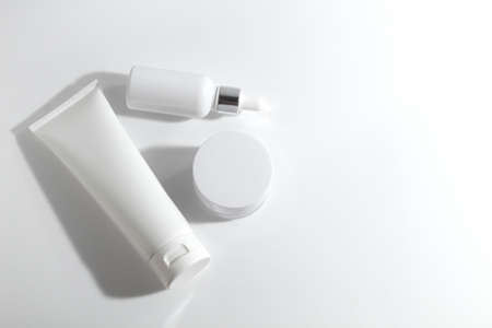 mockup of beauty fashion cosmetic makeup bottle lotion product with skincare healthcare concept on backgroundの写真素材