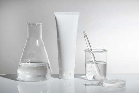 science experiment mockup of beauty fashion cosmetic makeup bottle lotion product with skincare...