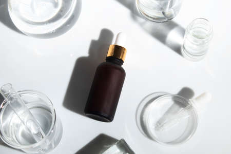 science experiment mockup of beauty fashion cosmetic makeup bottle lotion product with skincare healthcare concept on backgroundの写真素材