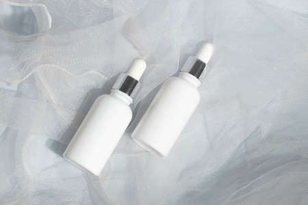 science experiment mockup of beauty fashion cosmetic makeup bottle lotion product with skincare healthcare concept on backgroundの写真素材