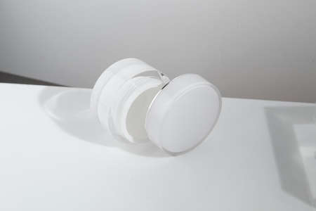 mockup of beauty fashion cosmetic makeup bottle lotion product with skincare healthcare concept on backgroundの写真素材