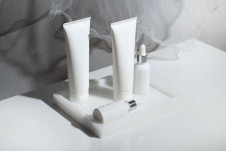 mockup of beauty fashion cosmetic makeup bottle lotion  serum product with skincare healthcare concept on backgroundの写真素材