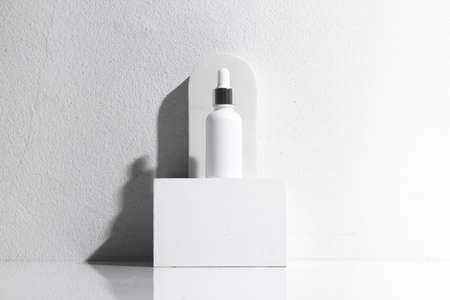mockup of beauty fashion cosmetic makeup bottle lotion  serum product with skincare healthcare concept on backgroundの写真素材
