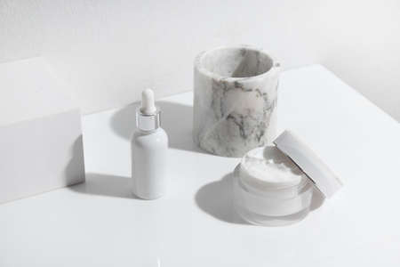 mockup of beauty fashion cosmetic makeup bottle lotion  serum product with skincare healthcare concept on backgroundの写真素材