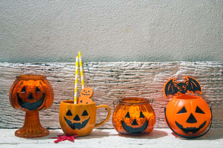 halloween on holiday season greeting night celebration party with grass cup pot decoration and trick or treat autumn october festival and jack-o-lantern conceptの写真素材