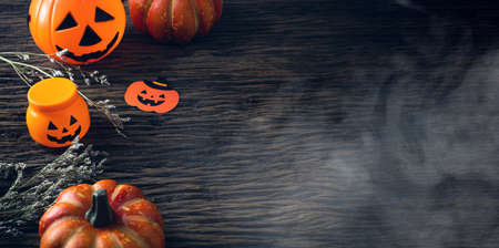 Top view halloween party with pumpkin decoraation prop on wood table, holiday season greetingの写真素材