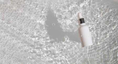 white water fresh background, cosmetic makeup bottle lotion cream product with beauty fashion skincare healthcare mockupの写真素材