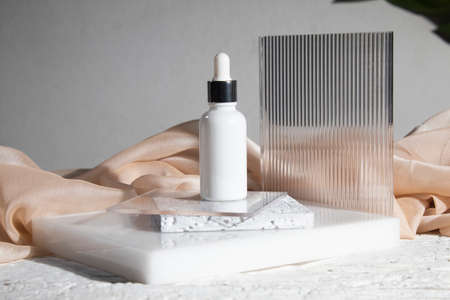 white wood table background with lifestyle, cosmetic makeup bottle lotion cream product with beauty fashion skincare healthcare mockupの写真素材