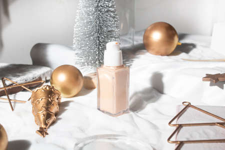 white snow background with lifestyle, cosmetic makeup bottle lotion cream product mockup with beauty...