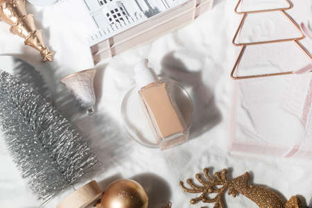 white snow background with lifestyle, cosmetic makeup bottle lotion cream product mockup with beauty...