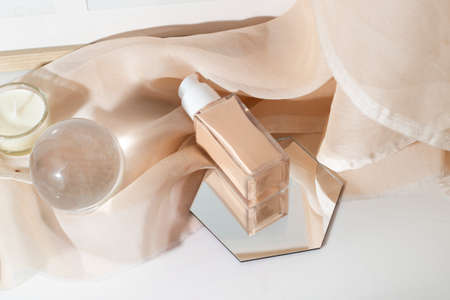 background, cosmetic makeup bottle lotion foundation primer cream product with beauty fashion...