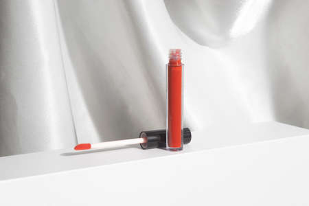 product template mockup, lipstick lip gloss with bottle container packaging, on white display background,の写真素材