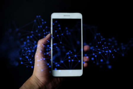hand pick mobile smartphone security hologram cloud storage with internet social network marketing digital concept, ai data deep learning, system hacker online technologyの写真素材