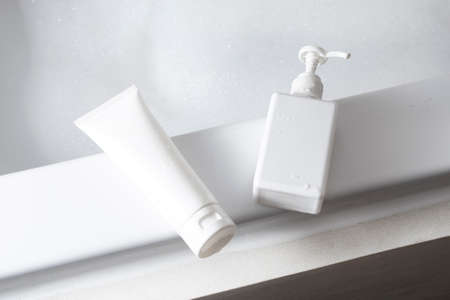 mockup of medical skin care bottle cosmetic tube of beauty makeup facial, treatment cleanser faceの写真素材