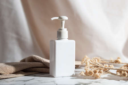 mockup of medical skin care bottle cosmetic tube of beauty makeup facial, treatment cleanser face foam, beauty healthcare branding packagingの写真素材