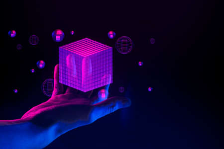businessman hand holding holographic of  metaverse network on black background, metaverse internet...