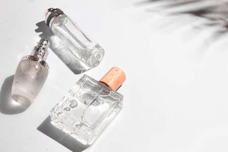 mockup of perfume skin care bottle cosmetic tube of beauty makeup facial, treatment cleanser face foam, beauty healthcare branding packaging in water splashの写真素材