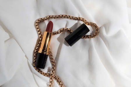 mockup of lipstick bottle cosmetic tube of beauty makeup facial, healthcare branding packagingの写真素材