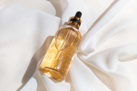 mockup of skin care serum dropper bottle cosmetic tube of beauty makeup facial, treatment cleanser face foam, sunscreen healthcare branding packagingの写真素材