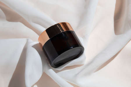 mockup of skin care serum dropper bottle cosmetic tube of beauty makeup facial, treatment cleanser face foam, sunscreen healthcare branding packagingの写真素材