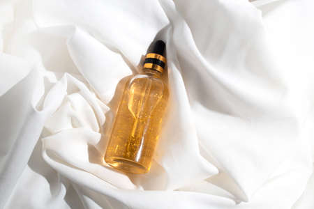 mockup of skin care serum dropper bottle cosmetic tube of beauty makeup facial, treatment cleanser face foam, sunscreen healthcare branding packagingの写真素材