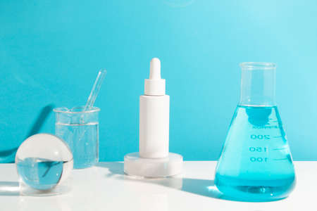 scientist and mockup tube bottle for skin care cosmetic , product branding, cream lotion treatment, laboratory room testing experimentalの写真素材