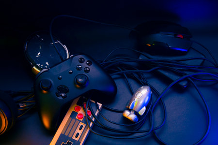 gamer playing the online game with joystick controller in neon glow dark cyberpunk room, gaming and...