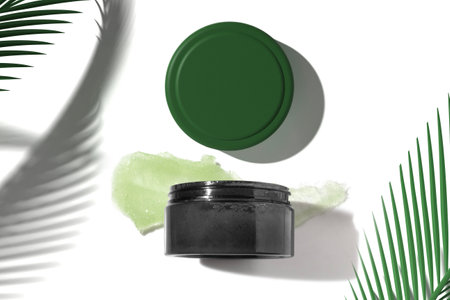 spa body lotion scrub sugar and salt smudge with skin care cosmetic concept, bath gel for hygiene treatment facialの写真素材