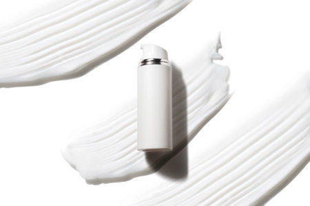 spa body lotion scrub sugar and salt smudge with skin care cosmetic concept, bath gel for hygiene treatment facialの写真素材