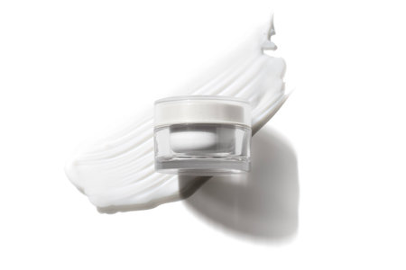 spa body lotion scrub sugar and salt smudge with skin care cosmetic concept, bath gel for hygiene treatment facialの写真素材