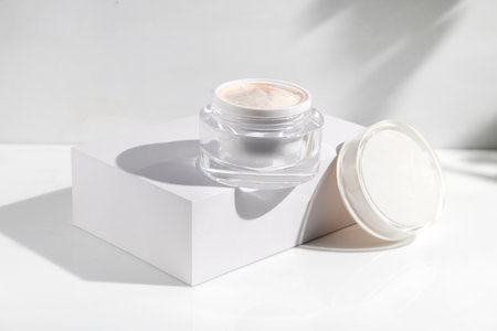 makeup cosmetic skin care, a mockup for cream lotion bottle product, packaging on white  waterdrop fresh with glass backgroundの写真素材