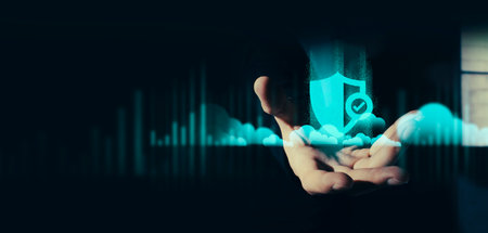 hand of businessman interactive touching a holographic of transaction financial network data system, concept of technology artificial intelligence with human user applicationの写真素材