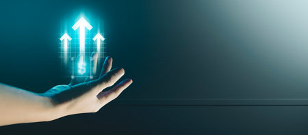 hand of businessman interactive touching a holographic of transaction financial network data system, concept of technology artificial intelligence with human user applicationの写真素材