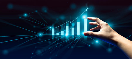 hand of businessman interactive touching a holographic of transaction financial network data system, concept of technology artificial intelligence with human user applicationの写真素材