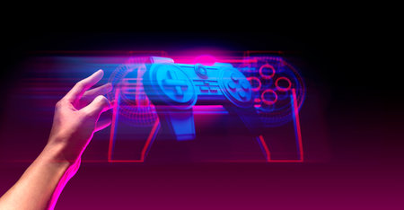 gamer hand touching and interactive to holographic of gaming joystick controller, game and esports technologyの写真素材