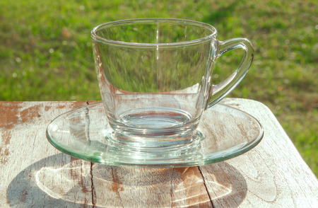 Glass of water on nature background sunshine sunlightの写真素材