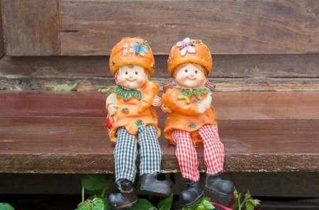 twin dolls with bamboo wall textures,love,valentineの写真素材