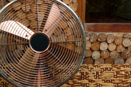 Beautiful antique  fan on a wooden backgroundsの写真素材