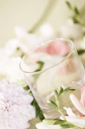 Gourmet dish on decorated table with flowersの写真素材
