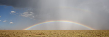 Rainbow at the Serengeti National Park, Tanzania, Africaの写真素材