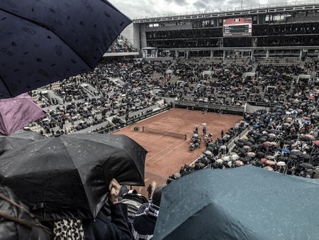 PARIS, France, June 7th, 2019 : Court Philippe Chatrier of the French Open Grand Slam tournament, in the rain before the construction of the roof, semi-final interrupted between Thiem and Djokovicのeditorial素材