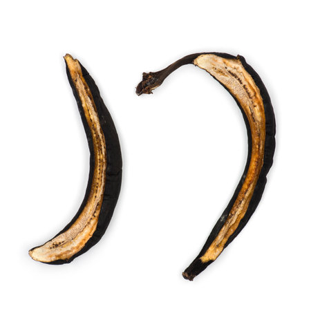 Decaying banana slices against white backgroundの写真素材